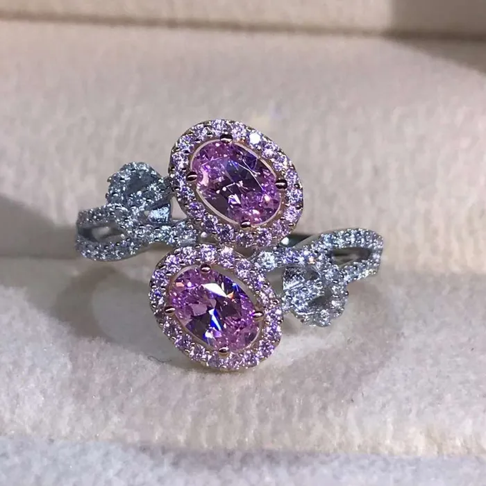 Leyloon Jewelry 1 Carat Pink Oval Cut Bypass Beadset Floating Halo Twisted Pave VVS Moissanite Ring Rings
