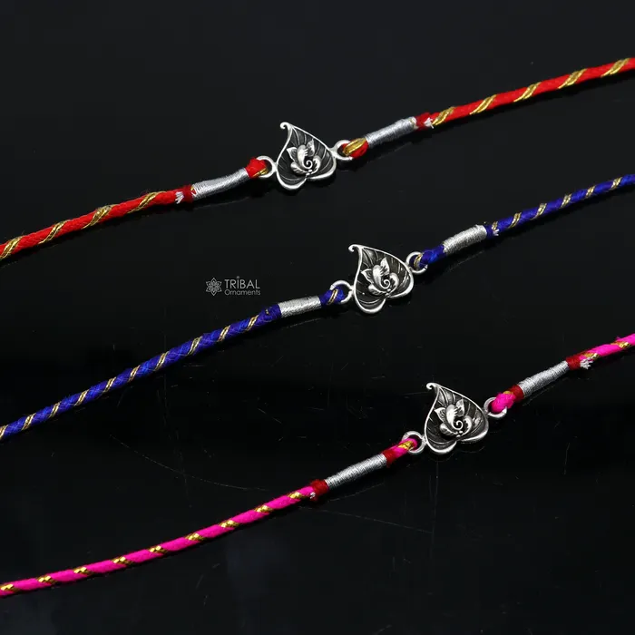 925 sterling silver handmade Rakhi Bracelet Exclusive lord Ganesha on betel leaf design pendant Rakhi Bracelet for Rakshabandhan rk294 TRIBAL ORNAMENTS Bracelets 925 sterling silver handmade Rakhi Bracelet Exclusive lord Ganesha on betel leaf design pendant Rakhi Bracelet for Rakshabandhan rk294 TRIBAL ORNAMENTS Bracelets