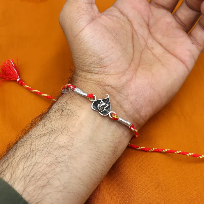 925 sterling silver handmade Rakhi Bracelet Exclusive lord Ganesha on betel leaf design pendant Rakhi Bracelet for Rakshabandhan rk294 TRIBAL ORNAMENTS Bracelets 925 sterling silver handmade Rakhi Bracelet Exclusive lord Ganesha on betel leaf design pendant Rakhi Bracelet for Rakshabandhan rk294 TRIBAL ORNAMENTS Bracelets