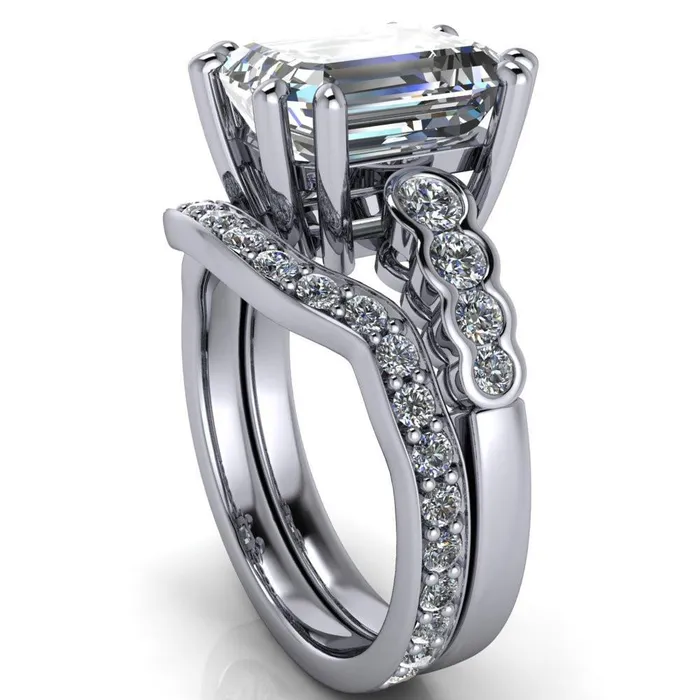 Calypso Emerald Center Stone 8 Prong Shared Bezel Shank Engagement Ring Fire Brilliance Rings