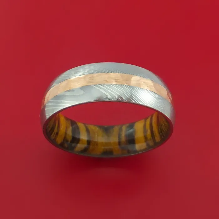 Lashbrook Damascus Steel Ring with 14k Rose Gold Inlay and Interior Hardwood Sleeve Custom Made Band Rings Lashbrook Damascus Steel Ring with 14k Rose Gold Inlay and Interior Hardwood Sleeve Custom Made Band Rings
