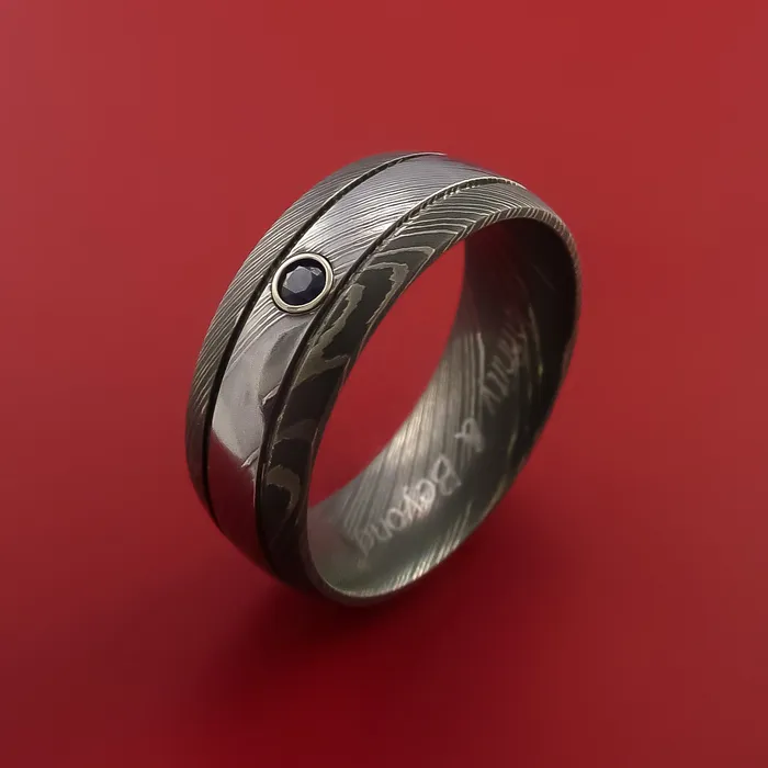 Rings Damascus Steel Ring with Groove Inlay and Blue Sapphire Custom Made Band Lashbrook Rings Damascus Steel Ring with Groove Inlay and Blue Sapphire Custom Made Band Lashbrook