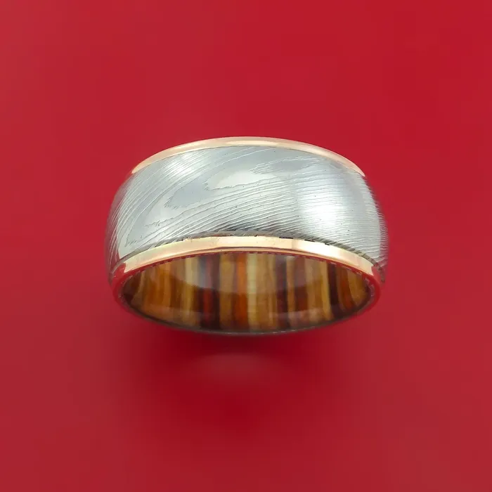 Rings Wide Damascus Steel Ring with 14k Rose Gold Edges and Interior Hardwood Sleeve Custom Made Band Lashbrook Rings Wide Damascus Steel Ring with 14k Rose Gold Edges and Interior Hardwood Sleeve Custom Made Band Lashbrook