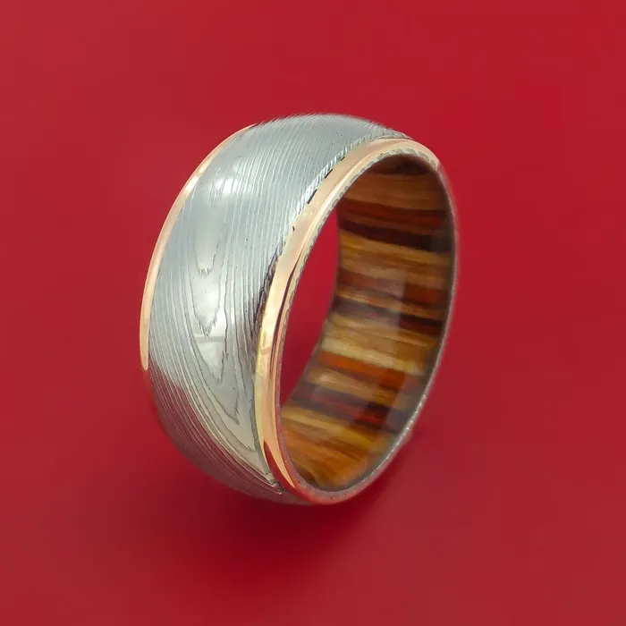 Rings Wide Damascus Steel Ring with 14k Rose Gold Edges and Interior Hardwood Sleeve Custom Made Band Lashbrook Rings Wide Damascus Steel Ring with 14k Rose Gold Edges and Interior Hardwood Sleeve Custom Made Band Lashbrook