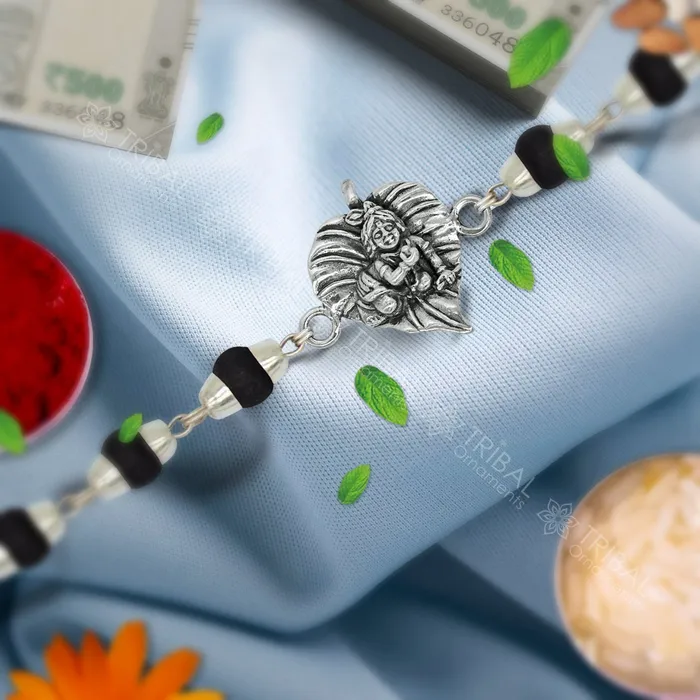 TRIBAL ORNAMENTS Lord Krishna fabulous design 925 sterling silver Rakhi bracelet in rudrakshblack basilwhite basil and silver beaded chain rk274 Bracelets TRIBAL ORNAMENTS Lord Krishna fabulous design 925 sterling silver Rakhi bracelet in rudrakshblack basilwhite basil and silver beaded chain rk274 Bracelets